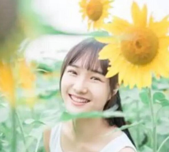 Photoshop把在向日葵中的女孩调出唯美日系暖色调效果   图老师